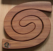 Mini Double Rimu Tablemat with Inlaid Paua Koru